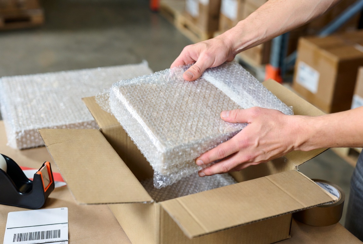 Forge Logistics fulfillment operations team packing orders in Lehi Utah